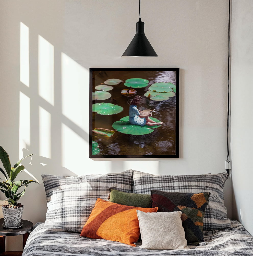 a serene scene of a person sitting on a lily pad in a pond, surrounded by green lily pads and a peaceful atmosphere.