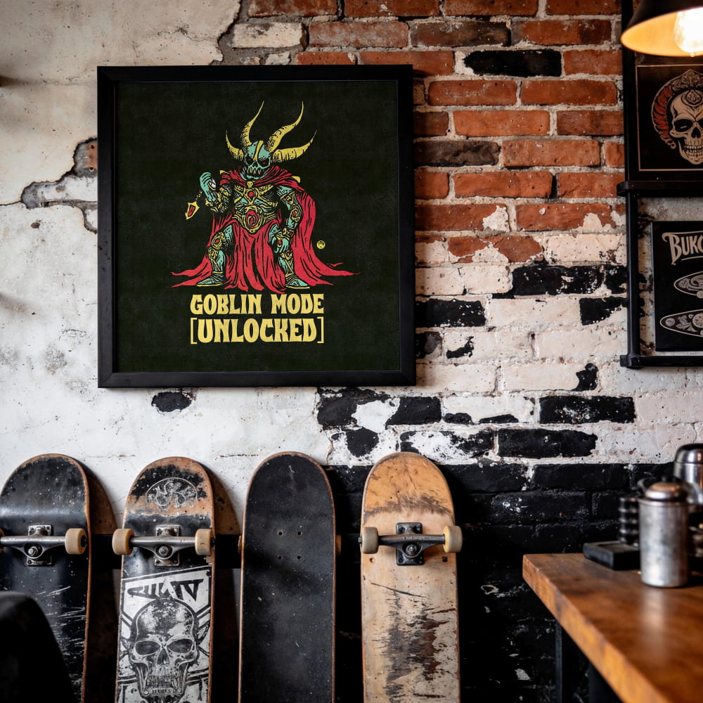 a framed poster of a green, horned, and armored character with the text "GOBlin mode (Unlocked)" on it, hanging on a brick wall. Below the poster, there are several skateboards lined up against the wall.