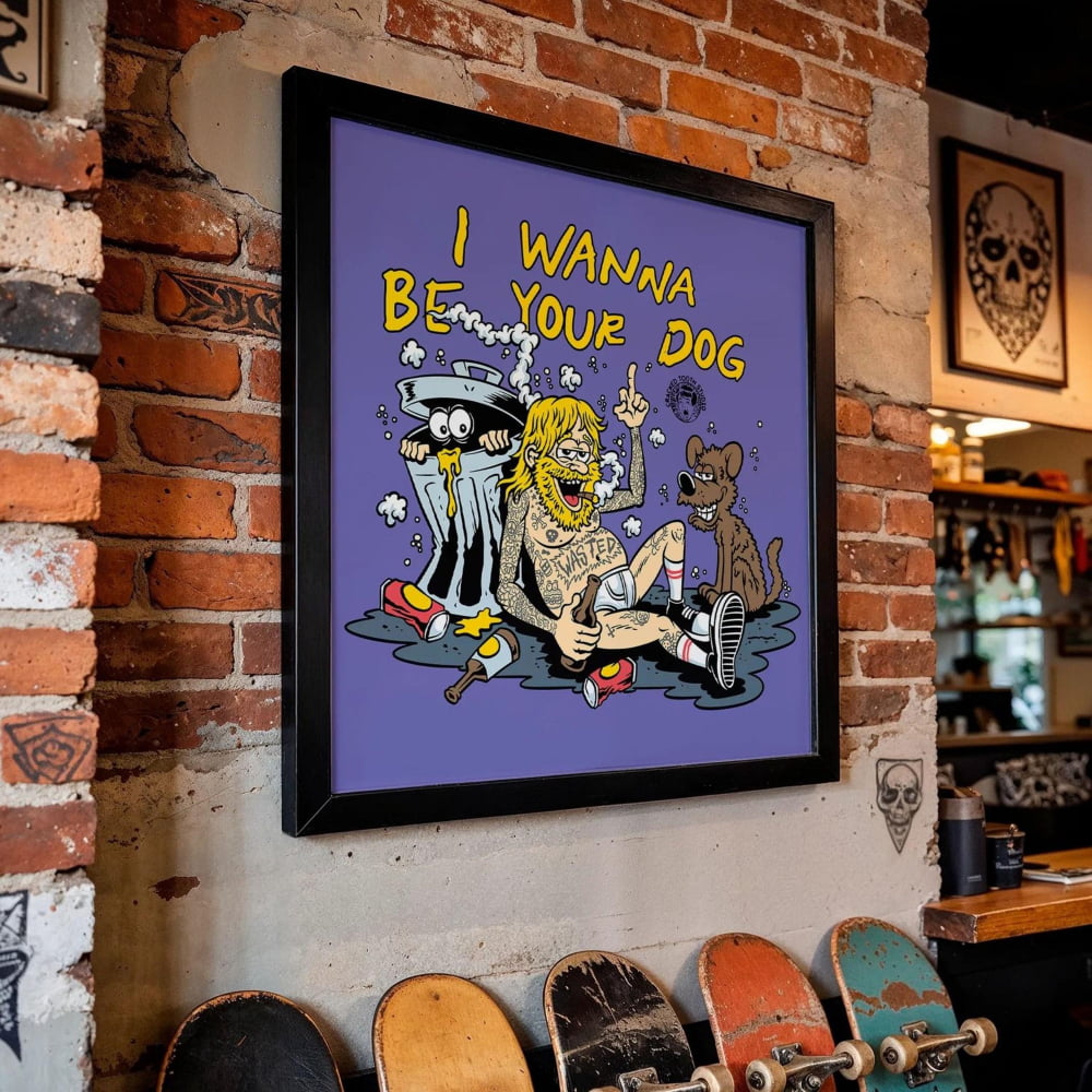 a framed cartoon-style illustration of a man sitting on the ground with a dog, accompanied by a skull and crossbones symbol. The text on the poster reads "I WANNA BE YOUR DOG".