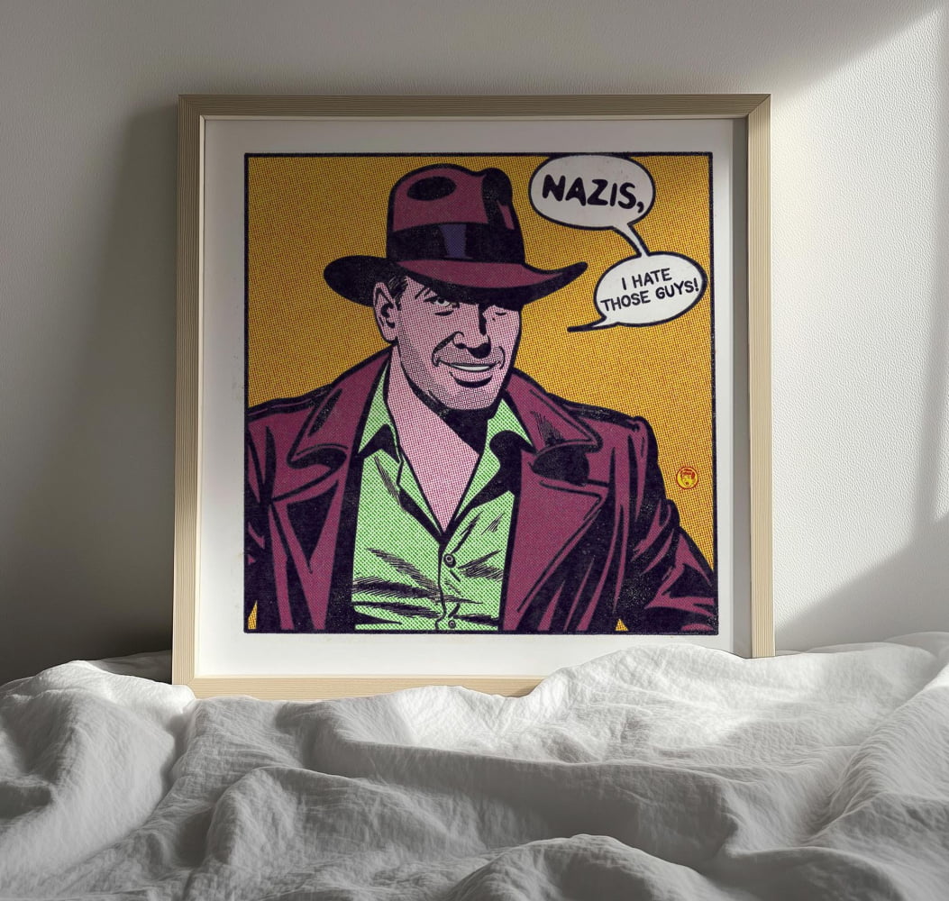 The image is a framed pop art-style illustration of a man wearing a fedora and a green shirt, with a speech bubble containing the word "NAZIS" and the phrase "I HATE THOSE WAYS!"