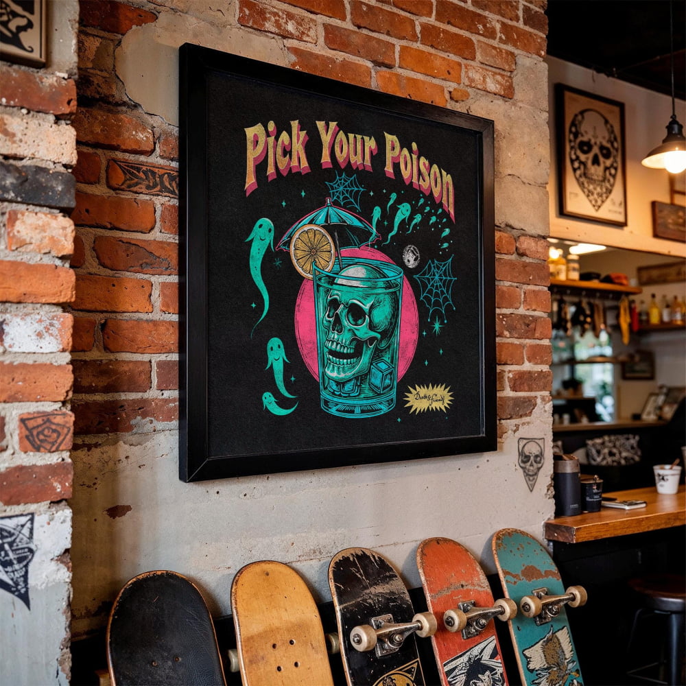 a framed poster with a skull and a cocktail glass, hanging on a brick wall. Below the poster, there are several skateboards lined up against the wall.