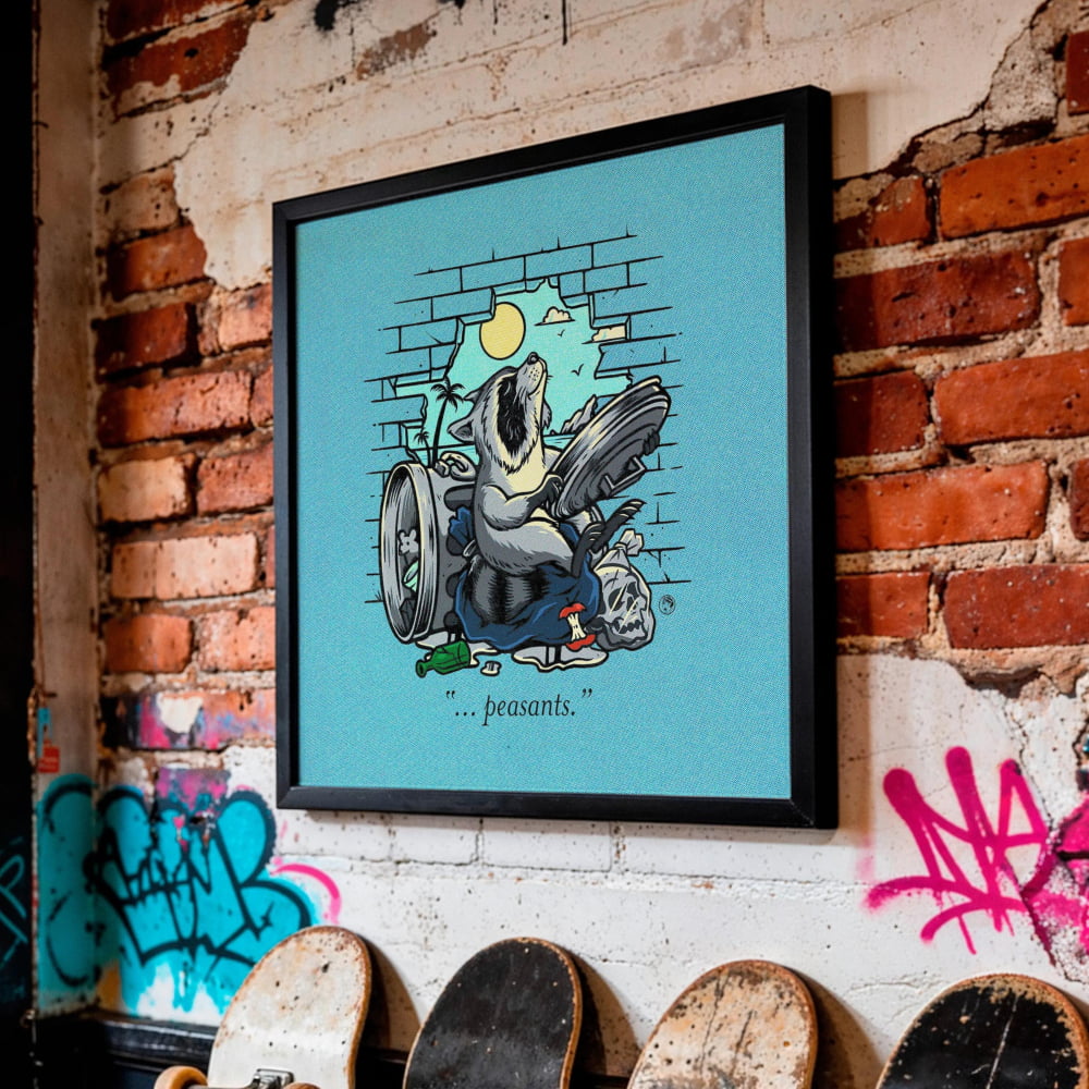 a wall with a framed illustration of a bird, a skateboard, and graffiti, along with several skateboards leaning against the wall.