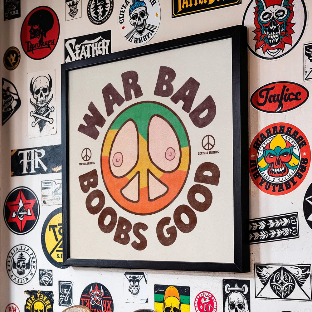 a wall adorned with a variety of stickers, posters, and graffiti, including a prominent poster with the text "WAR BAD BOBS GOOD" and a peace symbol.