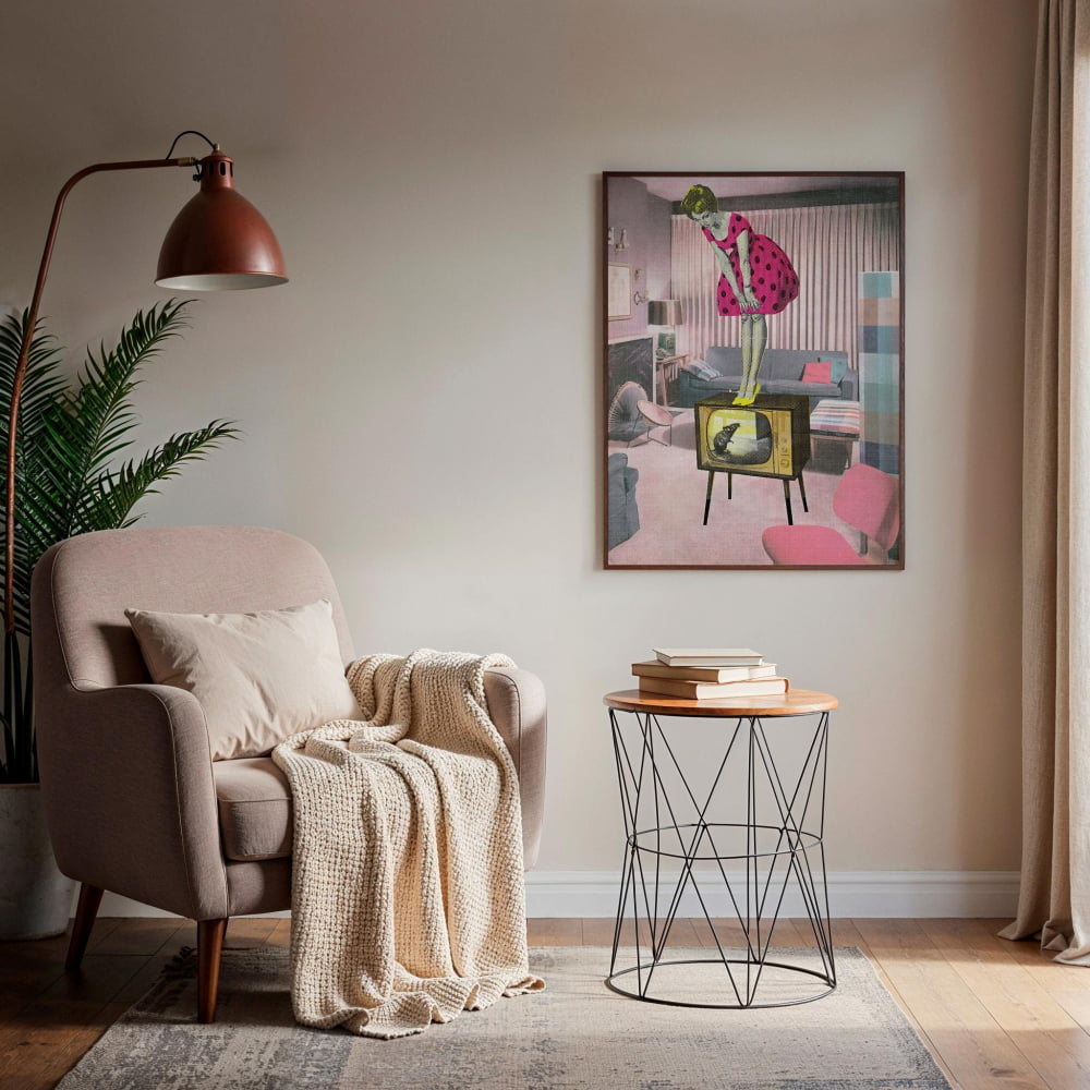 a cozy living room with a beige armchair, a small side table, and a framed artwork of a woman in a pink dress standing in front of a television.