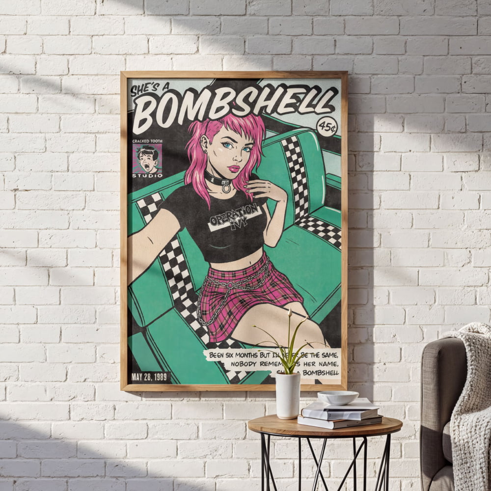 A framed poster of a woman with pink hair and a black and white checkered skirt, sitting on a green couch, is displayed on a white brick wall.